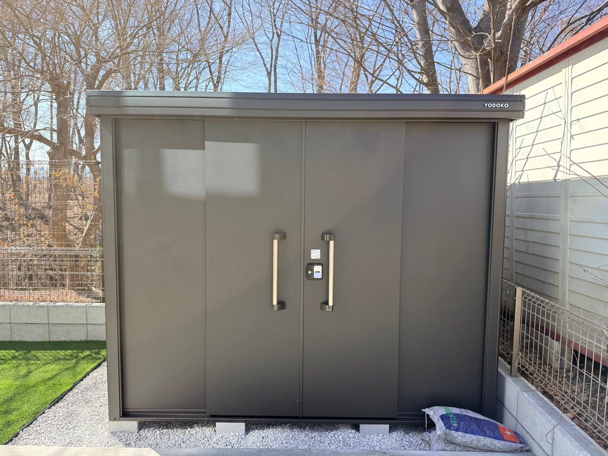 YODOKO LMDS Large Steel Stroage Shed in backyard