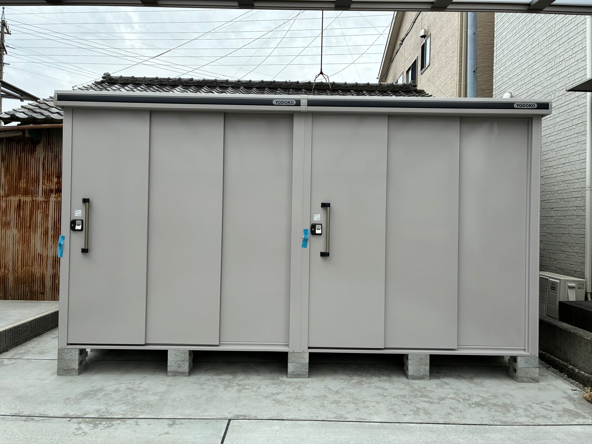 YODOKO LMDS Large Steel Stroage Shed in backyard