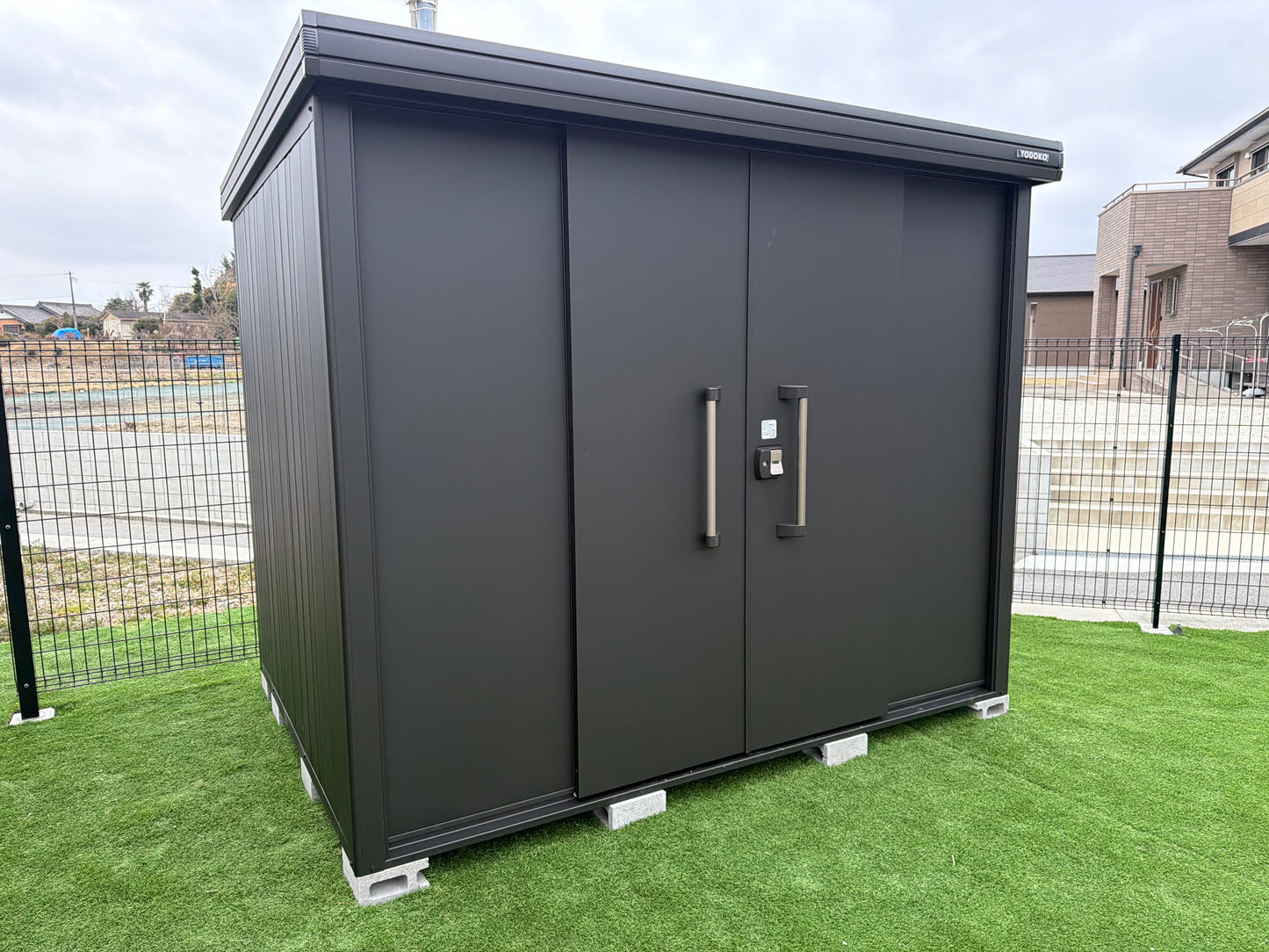 YODOKO LMDS Large Steel Stroage Shed in backyard
