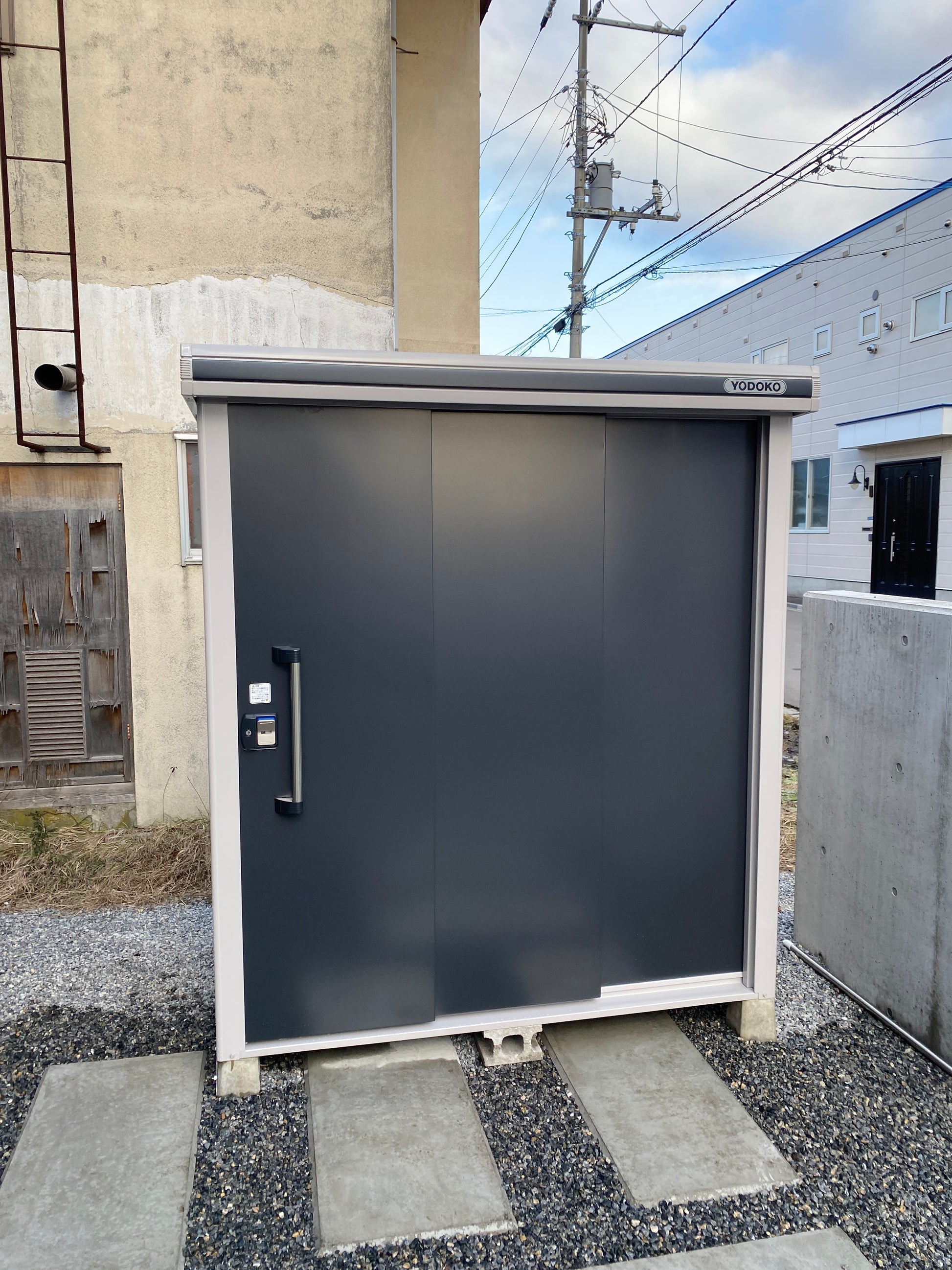YODOKO LMDS Large Steel Stroage Shed in backyard