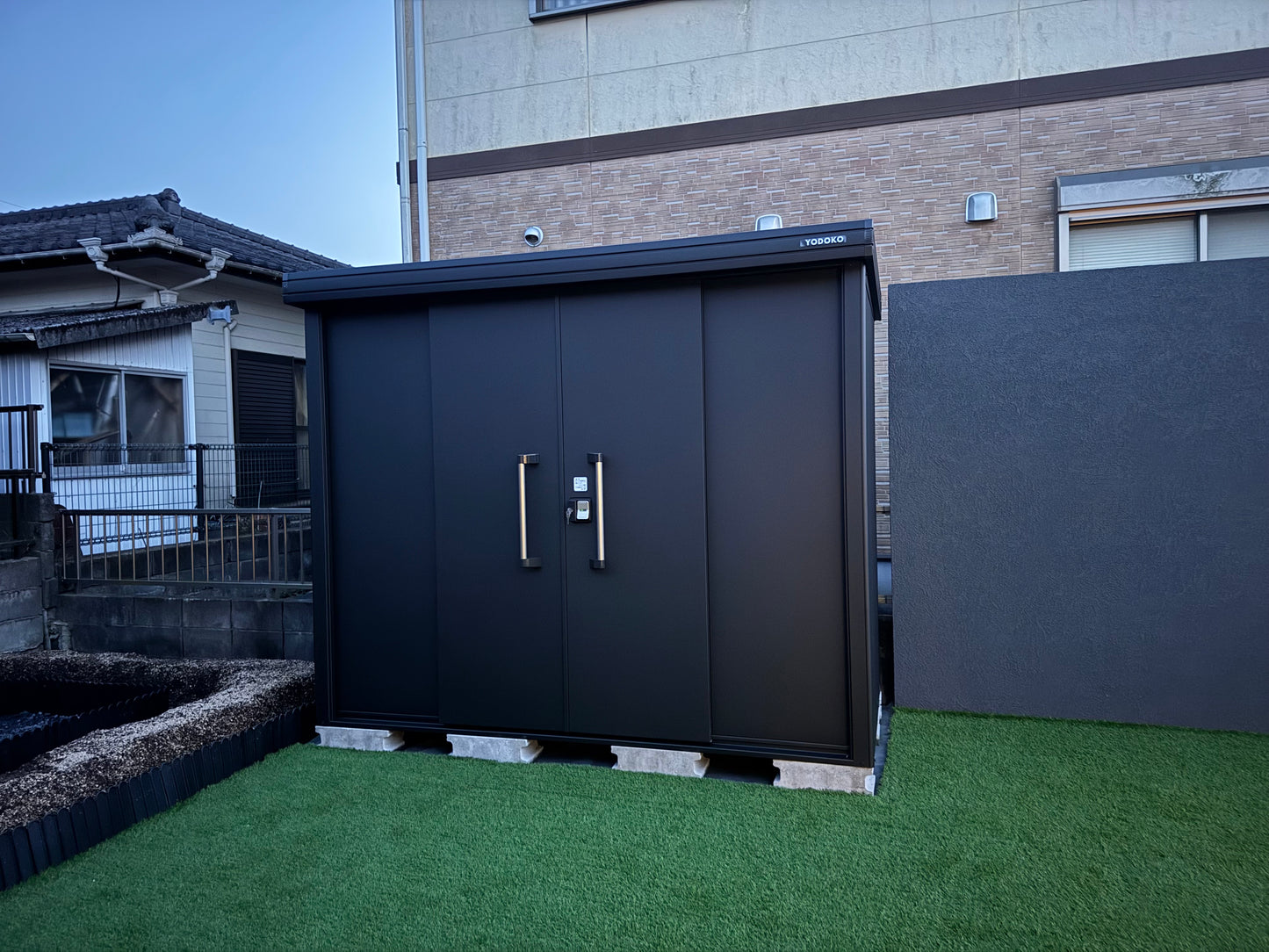 YODOKO LMDS Large Steel Stroage Shed in backyard